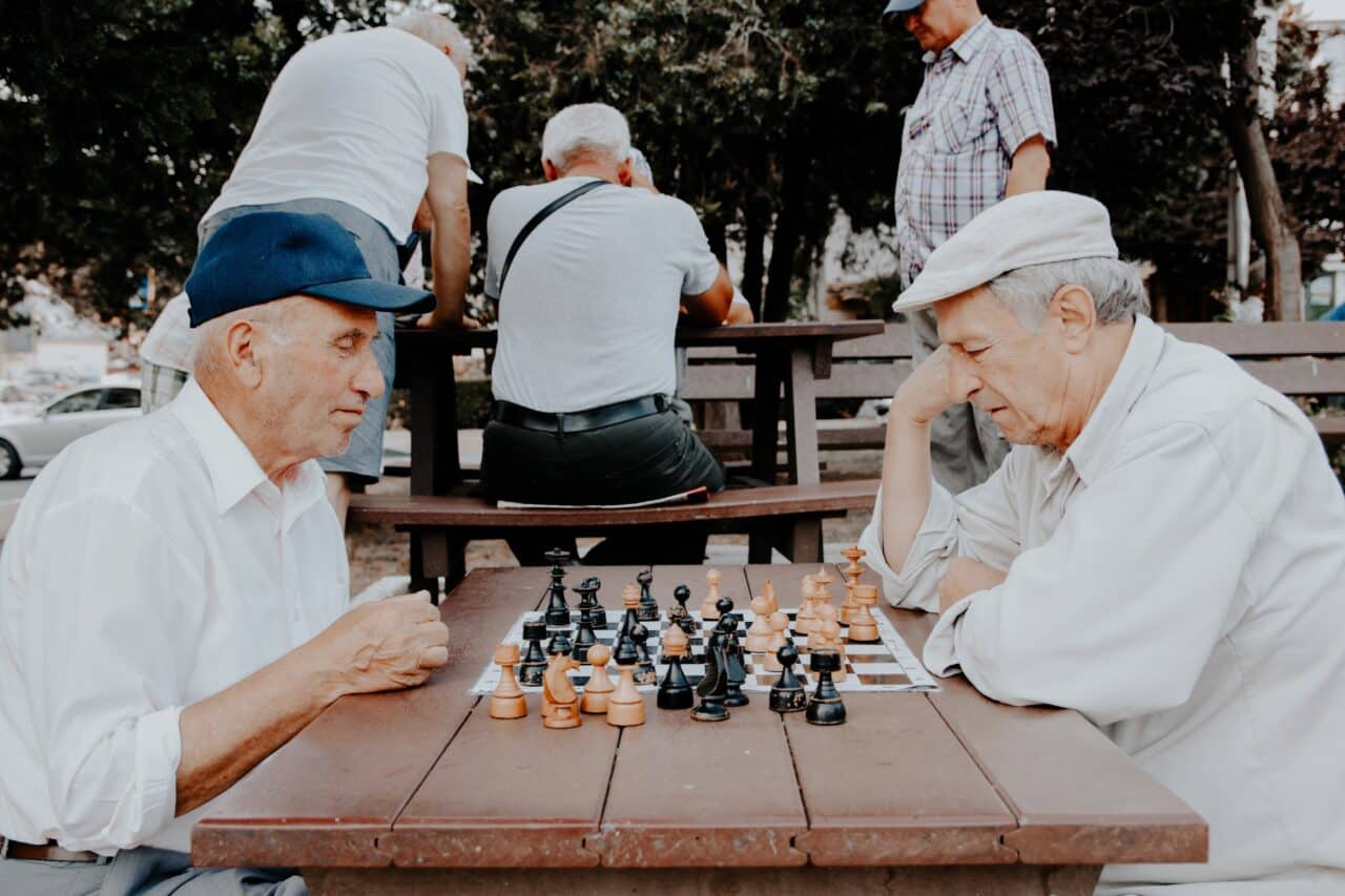 Older men playing chess.