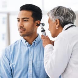 Man getting his hearing checked.
